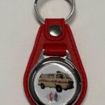 Photo d'un porte-clés représentant le motif de la voiture VW T3 Police Luxembourg